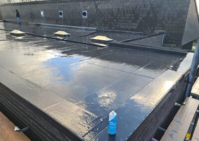 School Aycliffe Council Offices, Newton Aycliffe, 320m2 Firestone EPDM Warm Rubber Roof- 18mm OSB 3 Boards, 120mm Kingspan Insulation, Vapour Control Layer, 9mm OSB3 Boards, Boxed Parapet Walls, Firestone EPDM Rubber with Two New Box Gutters Project