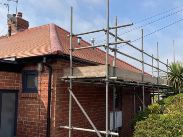 Forest Hall, Rosemary Clay Tile Re-Roof Project