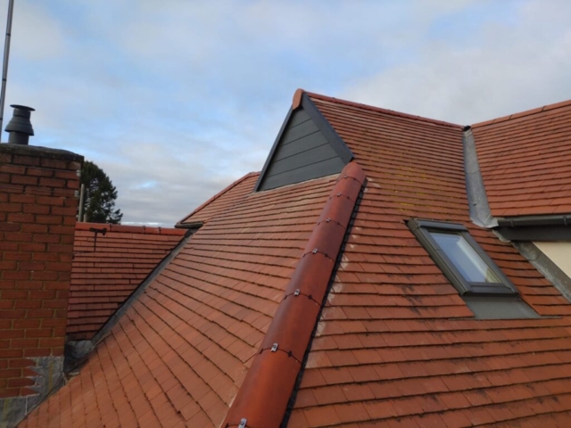 Darras Hall, Manthorpe Dry Ridge and Hip System with CREST Rustic Ridge Tiles, Hardi Plank VL in Anthracite with Insulated Cladding to Dormers with New Klober Linear Smart Verge System Project Darras Hall, Manthorpe Dry Ridge and Hip System with CREST Rustic Ridge Tiles, Hardi Plank VL in Anthracite with Insulated Cladding to Dormers with New Klober Linear Smart Verge System Project